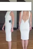 I wore this to my bridal shower and it was both super cute and comfortable. The only thing I didn't like is that I wanted to wear spanx with it and the back dips down too low so you would be able to see the top of the spanx if you didn't cut into it. - Zoe M.