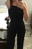 This jumpsuit is amazing! I have never been able to pull one off, but this was so flattering. I'm 5'5" and 125 lbs and ordered the XS. Fits perfectly. I have gotten so many compliments already! It is a bit long, so heels are a must. - Sandy B.