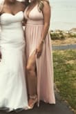 I wore it as a bridesmaid dress and I felt so pretty in it! I'm short so I had it hemmed and the straps brought in. It fit like a glove! - Ashley S.