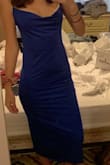 This dress was so cheaply made and overpriced for the terrible material it was made out of. The top is definitely not made for smaller chested girls, which is fine, but the rest of it didn't fit at all. I fit a size 0, so for even this to be big on me was the worst. - Daniela L.