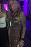 Wore this dress to a New Years ever party. It was perfect for the occasion. I got compliments all night. The perfect amount of sparkle and color. Fits very loosely in the stomach area. Very forgiving.  If form fitted is what you are looking for this is not it, but the comfort is there and the sparkle is great. - Michelle C.