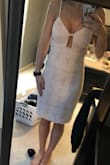 The material is light weight and so pretty! The keyhole makes it a little sexy! Returning it because I'm looking for something a little different for my shower! - Christina V.