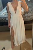This dress fits perfectly!! I can't wait to use it for my "trash the dress" photo shoot in the Dominican Republic. It fits true to size and I ordered s small. I'm 5'5" and have a larger rib cage so it's hard for me to find things that fit without being too snug. It fits great though! - Apollonia