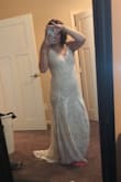 This was the 5th dress I ordered for my wedding and it's the first to fit how I want. It is also the exact color I want! It is a little darker than in the pictures but it's still amazing!! The waist does have a little stretch. I ordered a medium, but my waist measured at a large! Highly recommend it!! - Heather S.
