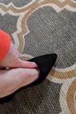 I absolutely love this shoe. Unfortunately I have to return them b/c the fit was too large and one shoe was actually larger than the other (almost as if it were stretched out somehow).  I am a solid 5.5, but these shoes had at least an extra quarter inch gap at the back of the heel and there was also a sizeable gap between the top of the shoe and the top of my foot (I could fit my index finger under it). 
If they offered this shoe in a size 5, I'd order it a heartbeat. But alas, I will have to do without this wonderful, versatile shoe. - Amanda D.