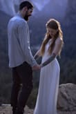 Dress fits true to size; extra long so had it altered slightly. Fabric is rich and heavy. Feels and looks like a more expensive dress. Held up well along the hike to our ceremony location! - Brit N.