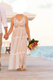 I wore this as my wedding dress (8 months postpartum and nursing). LOVED IT! The straps were adjustable, which was great. I had to hem about 7-8 inches off of the length, but it was easy to do myself with a sewing machine. The top was a little snug on me but not uncomfortable. I couldn't fit a bra underneath, but the material at the top was thick enough that it was fine. Size small fit great in the waist with plenty of room to breathe around the rib cage. Overall, very comfortable dress. Would highly recommend. So much prettier in person! - Amy K.
