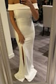 Dress fits great, material is nice and thick. Classy and elegant! - Christine R.