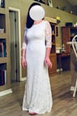 I really wanted to love this dress after seeing it on the site, it checked a lot of my boxes. Unfortunately, once I got it on, it was too short, barely skimming the floor even when I was barefoot. The fit was nice, the back lovely, the lace pretty and delicate. Just not long enough :( - Stephanie S.