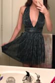 Let me start by saying that I loved the concept of this dress, and when it arrived the dress was very well made. It didn't seem cheap at all, and I loved the fabric (which glimmered beautifully). However, the top of the dress was just way too large. I ordered a size XS, and the whole dress fit except for the chest. It fell mid thigh. The waist was tight and gave me a shape without suffocating me, but the chest was SO large,. This isn't the type of dress you can wear a bra with for extra padding or support. I felt like I had a lot of side boob going on, and that any wrong move and I'd flash everyone. Sadly I returned this one. It would work if you have a larger chest than me! I'm a 32C. - Nada C.