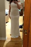 This dress has nice, thicker fabric. It fits like a glove for a sexier style as it fit around my waist and curves perfectly. I tried it on for a wedding dress, but I ended up going with another ivory option. It's a great option for someone looking for a blank canvas to accessorize with. - Ashley P.