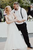 I purchased this dress in a 3 AM panic the month of my wedding (May). I realized I wouldn't be able to dance my first dance in the wedding dress I had already ordered. When it arrived I was completely in love with it. It's completely stunning and I was able to dance the night away in it. I want an excuse to wear it again! - Emily R.