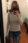 I really like this long sleeve. The sleeve length is perfect and I love how flattering it is. The fabric is really soft! I bought a small, but I would probably go with a medium only because my torso is very long. The shirt is just a tad shorter than I would normally buy (hits right at the jeans). - Erin S.
