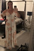 The dress fits amazingly and made my boyfriend stop in his tracks. Looking forward to wearing it at my sister's wedding! Definitely long, so will need some good heels. - Hannah S.