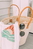 So cute! I love having basket bags for the beach, the market, and as a photo prop! This one I took on vacation and it was perfect for walking around town. - Dowling P.
