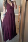 I bought this for a wedding, and am in love with it! The material is amazing, and it fits perfect. It even supports my chest without really even needing a bra. The only small thing I have to change about it is the length, cause it's just a little too long, unless you wear very tall heels. Besides that, I will definitely be wearing again. :-) - Erin R.