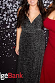 This dress is simple and gorgeous! The material is great quality, not see-through but still thin and love the way it falls. It sparkles without leaving glitter all over the place. I'm not a fan of wrap dresses for my figure, but it was still flattering. As for the fit: I'm short and the dress runs long, it still trailed behind me a little with 4" heels but I never tripped on it. I am busty so there is a cleavage, but it wasn't a problem. Overall, this style runs large so definitely size down. I hope to find another occasion to wear this dress, it was just so much fun! - Grace M.