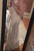 I tried on so many dresses trying to find the perfect dress for my forest wedding. I thought I had found "the one", but after this came in the mail and I tried it on, I was shocked with how much this dress change my opinion. I'll be adding some beaded sleeve caps, and taking it in a little under the bust but other this fit AMAZING. The material is really good quality- even better than some of the $1,000 + ones I tried on in stores. Seriously amazed by this dress! - Tiffany O.