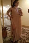OMG this dress is so elegant and has a nice flow for when you move or dance around. It was easy to put on and take off, you can either slide it up or slip it on over your head. This dress does not have any zippers or buttons and the waist is elastic, so even though I normally wear a large in shirts and a 12 in jeans I decided to go with a small. I also saw on other reviews that the dress runs large. I needed to wear a safety pin so that my bra didn't show and it could stay in place, but that's only because I have a small bust. I would definitely buy this dress in other colors! - Jasmin M.