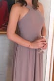 Had to have the straps shortened a bit and about an inch off of the bottom. Some girls had cups added to the dress, but I wore stickies and they were not noticeable at all. Very comfortable and looks good with any skin tone. - Julia C.