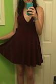 This dress was super duper beautiful. I ended up returning it because of the length (it is very short which I usually wouldn't mind but because it was for a school dance the length made me a little nervous) but I genuinely almost kept it anyway. The dress was very flattering, I have wide hips but I feel like it gave me a very feminine and A-line silhouette. I love the color as well. But just a warning, to me the dress looked very formal and starchy in the picture but in real life it's more cottony and stretchy which I don't mind at all because it's super comfy. - Emma H.