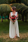 Wore this for my wedding in Costa Rica and it was perfect! My bust did show a litttttle too much when I bent over, but I am pretty small-chested. I even went in the ocean in my dress, then washed it in the washing machine on "delicate" and used a bit of bleach when I got home and it's as good as new. - Allison F.