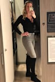 I bought this in black and it fit great! I do have a long torso so I was nervous about it being long enough, but it definitely was and looked great with jeans and boots. It was not too low cut and I could wear a regular bra with it. It's so great, I want to buy it in maroon, too! - Colleen T.
