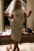 Dress fit true to size. Form fitting but comfortable and roomy at the same time. Absolutely loved and got a ton of compliments on it! Probably could have gotten away with a small but was very happy with the medium. - Lauren B.
