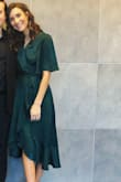 I loved wearing this dress to a wedding just this month. The fabric is beautiful and subtle if you're someone who likes very deep tones. Tends to come about a bit darker in some lighting, but excellent quality and the fit is true to size. A little baggy for smaller chests, but not to a negative degree. I got so many compliments on my dress, and I easily danced the night away with no issues! (: - Brittney W.