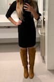 After reading the reviews I was nervous this dress might be tight fitting. I've purchased several size small Lulus dresses and have experienced both the dress feeling too tight and too loose. Overall I would say this dress is pretty loose and comfortable. Perfect for work or for a night out. It's definitely my go to look when it's cold out! - Jennifer C.