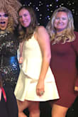 Purchased this for my bachelorette party, and it fit perfectly! I'm between a medium and a large due to my thick thighs and bum. The shape of this dress was perfect as it flowed perfectly to hide my hips. Love the stretch it had to it. I did add a little latch right above the zipper, so the dress wouldn't pull at the zipper. - Stacy N.