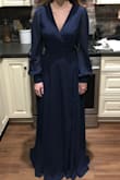 I got this dress for engagement photos and it was beautiful! I'm 5'4", 110lbs. I have a small waist measurement, and this dress fit great in the chest and waist. It was definitely made for someone tall y'all. The dress was 4 inches too long, and the sleeves were a little longer than I would have liked. I had it hemmed, and it was great! The color was beautiful and the quality is amazing. Seems like it would be a designer dress. Definitely worth the buy. - Erica J.
