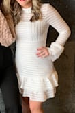 This dress was so perfect for my winter bridal shower! Chic, cute, and long sleeved. I ordered an M and it was the perfect fit! I got so many compliments on it. The top is a little see-through, but I wore a normal bra and you could barely see it with my hair. - Haleigh D.