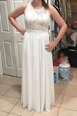 I bought this dress for my 13 year old daughter to wear to a Cotillion formal ball. The dress fit perfectly, and with three inch heels it was the correct length. Most important ting to her was that she was able to to wear a regular bra!! The dress is well made, layers of material so it isn't see through, but isn't too hot either. Hand washable with line dry and light iron. I didn't try it though. - Michelle W.