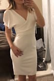 Very nice fit. I love the length and can wear to work or any event. - Charla F.