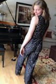 My daughter needed an outfit for a semi formal event at work. We ordered this in both XS and S because she is short. We were concerned that the length on the S would be too long. The length on either would have been just fine for her with her tall strappy sandals. The XS was too tight in the waist and butt.  The small was perfect in every way! Here she is clowning around without shoes, makeup or accessories. - Patti N.