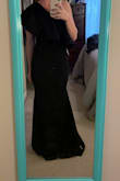I bought this dress for a fundraising gala and it was perfect! I am short (5'2) and petite so it was pretty long on me, so I had to get a chunk hemmed at the bottom. It is tight fitting around the waist and booty and the shoulder fluff is bigger than I anticipated but still super cute! - Catherine W.