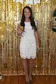 This dress was perfect for my Bridal Shower. The material was comfortable and was forgiving even after I hit up the mimosa bar. I got so many compliments on this dress, and the back, AMAZING! - Megan K.