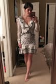 I love this dress! It fits perfect and hugs in all the right places. I also love the color black, and I like that the black trim is added to a feminine lace dress to make it more edgy and cool. - Torey S.