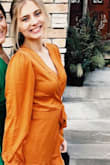 The dress was stunning! It looked great in pictures and all around was a great fit. The only downside was that it was a bit static-y (if thats how you spell it). It kept up riding up my butt and sticking to my thighs. It didnt look wierd, it just felt a little uncomfortable at times. - Claudia O.
