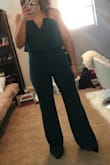 I lovedddd wearing this jumpsuit. I felt GREAT in it, and the green is beautiful. It fit true to size. The pant is a little long, so I had to wear some taller heels. I wore it for a wedding and it was perfect. I felt super confident in it. I am just in love with this jumpsuit and can't wait to wear it agin! - Kelsey H.
