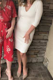 I wore this dress for my bridal shower and it was a hit! The material is thick and therefore forgiving, even though it is white. It is classy, but subtly sexy at the same time - I felt great in it and I am not usually a fan of bodycon dresses. It was a tiny bit tight in the lower hip area, but I wouldn't have ordered a larger size. - Madison W.