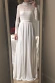 This dress fits to a T! I love it so much!! I haven't worn it on the big day yet, but I'm so excited about it! - Madisen S.