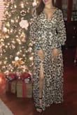 Fits true to size. Shows a little bust. Quality is good! Wore it for by birthday dinner and received many compliments. I wore it with simple one strap heels. A little long but the heels took care of that! - Rosalia S.