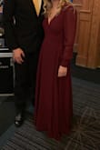 Dress looked very pretty and I loved it. I did have to hem it slightly since it was too long. There is a lot of fabric so it is slightly heavy, but also makes it feel like better quality! - Dixie M.
