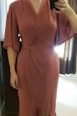 This dress does not look nearly as good on me as it does the model. Makes hips look really big. I like the material as far as comfort, but just not very flattering at all. - Lisa C.