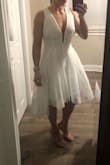Good fit... ordered a small and I probably cold have went into an XS but the small was okay. Used this for wedding pictures and my elopement. Good fabric and didn't need to wear a bra, which was a plus in my book. The outer layer added a little more "puff" than I would have liked as it accentuated my hips but other than that, the fit was good. - Ashlee J.