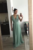 This dress is beautiful. The colour is true to the photo and the material is so flowy. It runs a bit large, however that is better than running too small! I can't wait to wear it as a bridesmaid in my friends wedding in April. - Melissa T.