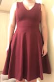 Got the dress for a dinner. The material is pretty thick, so it hangs well. The skirt is a little more full than I thought it would be, but I think that allows more mobility. It is definitely pretty high quality. I also really like that the back goes all the way up because I can wear a normal bra. Perfect combo of comfortable and stylish to spend a late night out in! - Beth J.
