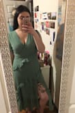 Super into this dress! I got it for a wedding coming up this spring. The length is a bit awkward - not knee length but not maxi or even tea length. I don't think I could get it hemmed because of the ruffles, but I think with the right heel it will be super cute. It's very flattering up top and fits perfectly overall. The color and material are great and I hope I can find the right accessories because it's exactly what I wanted save for an awkward length! - Olivia W.